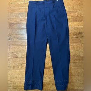 Crown & Ivy navy cropped pants. Size 4. Lattice design cutouts  on legs. New.